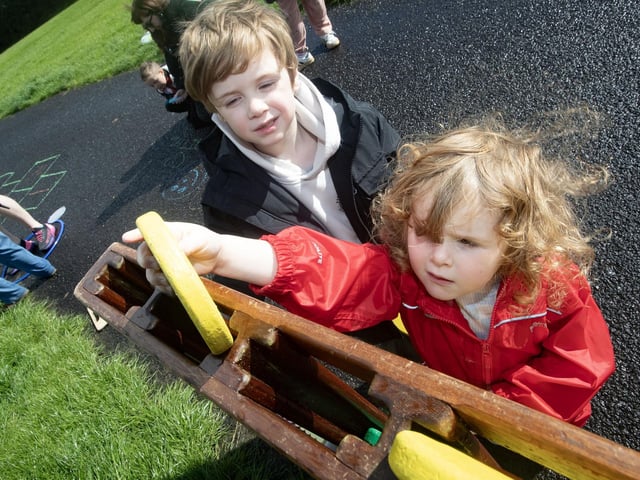 Finn (5) and Fiadh (3) Craig enjoying Saturday's fun and frolics at Woodburn Urban Park. : .