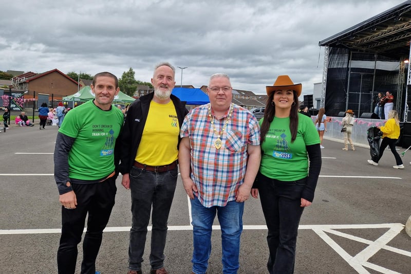 (l-r) Tommy Mullan, Galliagh Community Centre Manager and Coordinator of Galliagh Féile, with Cathal Crumley, Deputy Mayor Alderman Darren Guy and Aileen Mellon.