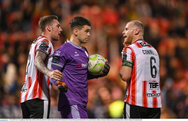 FULLY FOCUSSED . . . Derry City goalkeeper Brian Maher with Kevin Holt, left, and Mark Connolly, right.