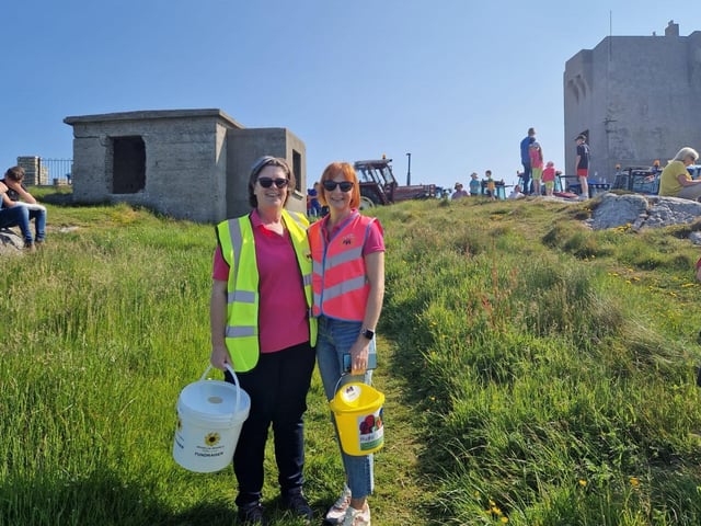 Fundraisers collecting around Banba's Crown.