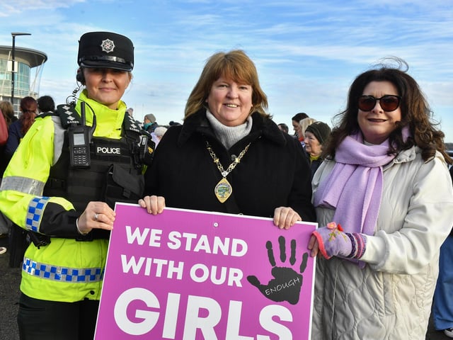 PSNI Chief Inspector Cherith Craig, Deputy Mayor Alderman Niree McMorris and Karen Henderson, DCSDC, pictured at the Foyle Women’s Aid walk, from Sainsbury’s to the Guildhall on Sunday afternoon, supporting the United Nations Women’s Campaign to eliminate gender – based violence worldwide. Photo: George Sweeney