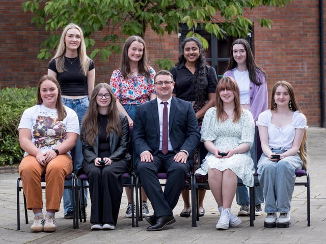 Top Performing Students at A2 Level
Front Row: Una McDermott, Cara McLaughlin, Mr D. McCay (Head of Senior School), Niamh Carlin, Aimee Hughes, 
Back Row: Kate McCloskey, Anna McWilliams, Katelyn Austin, Niamh Kennedy
