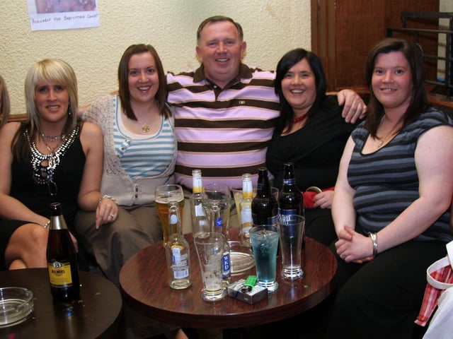 Donal poses for the photographer with his nieces, Mandy, michaela, Caroline, Shauna, Michaela and Kelly 0219JML : Parties and celebrations across Derry in May 2006.
