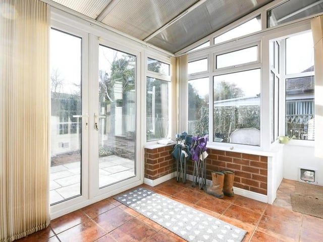 This large conservatory completes our look at the ground floor of the Prospect Street property. Underfloor heating gives this room added appeal, while double-glazed windows overlook, and a door leads to, the side and back of the house.