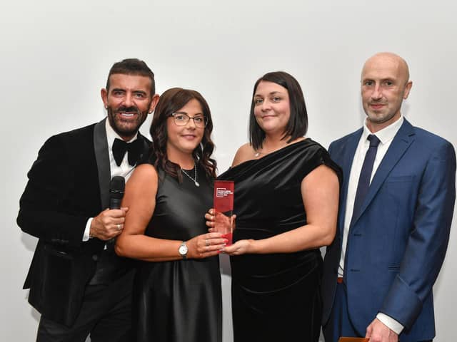 Derry Journal / BetMcLean People of the Year Awards 2025. Winner of the Special Ambassador Award, sponsored by the Derry Journal was Sister Clare Crockett.  Clare sisters Shauna and Megan, accepting the award, are pictured with Event Host Micky Doherty and Brendan McDaid, editor of The Derry Journal. Photo: George Sweeney