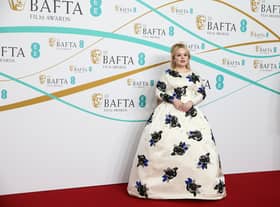 Irish actress Nicola Coughlan poses on the red carpet upon arrival at the BAFTA British Academy Film Awards at the Royal Festival Hall, Southbank Centre, in London, on February 19, 2023. (Photo by ISABEL INFANTES / AFP) (Photo by ISABEL INFANTES/AFP via Getty Images)