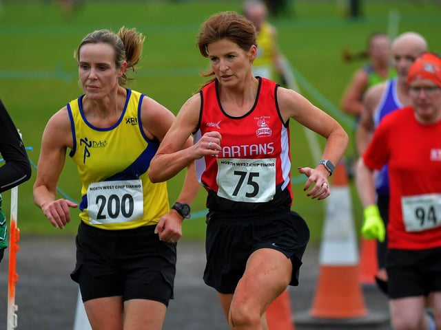 Spartan Catherine Hribar (75) competing in the Spartans open cross country 6k race at Thornhill College on Saturday. Photo: George Sweeney