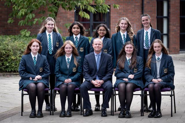Top Performing Students at GCSE
Front Row: Clara McDevitt, Orla O'Doherty, Dr N. Morewood (Head or Year), Roisin O'Donnell, Clare O'Neill
Back Row: Ellie Owen, Elena Perchani, Helen Simmy, Beth Tinney, Hannah Wade (missing from photograph Ellie Vafias)