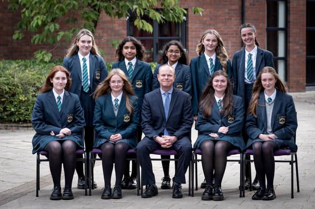 Top Performing Students at GCSE
Front Row: Clara McDevitt, Orla O'Doherty, Dr N. Morewood (Head or Year), Roisin O'Donnell, Clare O'Neill
Back Row: Ellie Owen, Elena Perchani, Helen Simmy, Beth Tinney, Hannah Wade (missing from photograph Ellie Vafias)
