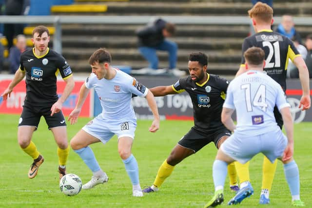 Derry City striker Danny Mullen takes on the Finn Harps defence during Sunday's friendly with Finn Harps. (Photo: Kevin Moore/MCI)