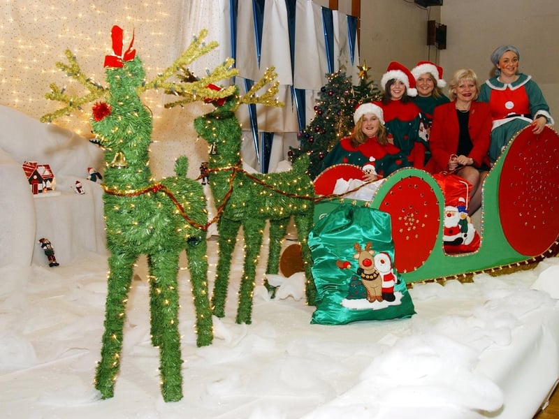Mrs. Elaine Way, chief executive, Foyle Trust, guest speaker at St. Cecilia's College prizegiving takes a break from proceeding to view the Christmas installation by 6th Year Art students Fiona Curran, Claire Doherty, Marina Kivelehan and Sinead Quinn. (1912C19):.