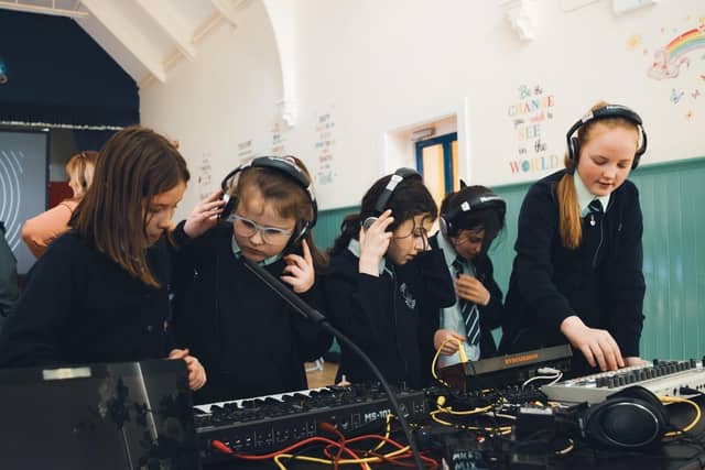 Students from St Eugene's PS, Nazareth House PS, Gaelscoil Éadain Mhóir and Long Tower PS took part in four high-energy creative sessions held in schools and community centres, giving many their first experience of cutting-edge music and digital technology.