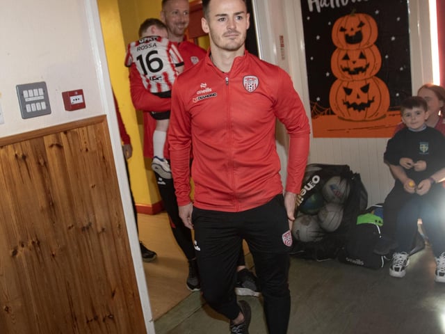 Huge ovation as the Derry City players enter the assembly hall on Tuesday.