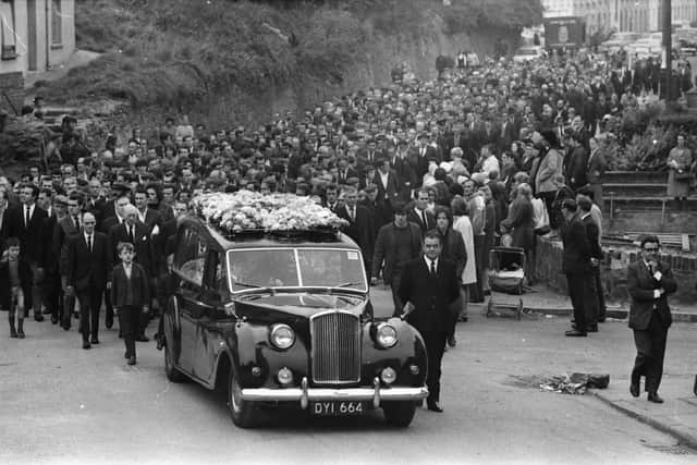 The funeral cortege of William McGreanery makes it way across Laburnum Terrace past the spot where he was shot dead on September 15, 1971.