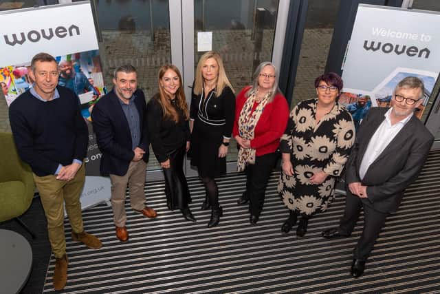 Woven staff L-R Jason Hardy, Head of Development; Peter O’Reilly, Head of IT; Katrina Smyth, Director of Development; Paula Ewart, Interim Executive; Ruth Mulholland, Head of HR; Judith McNamee, Head of Housing; Derek Johnston, Director of Finance and Corporate Services.