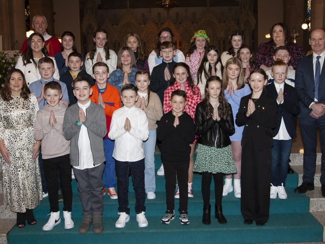 Pupils from Rosemount PS who received the Sacrament of Confirmation from Fr. Paul Farren at St. Eugene’s Cathedral on Friday last. Included is Mr. Paul Bradley, Principal, Mrs. Meenan, teacher, Ms. Begley and Mrs. McGuinness. (Photo: Jim McCafferty Photography)