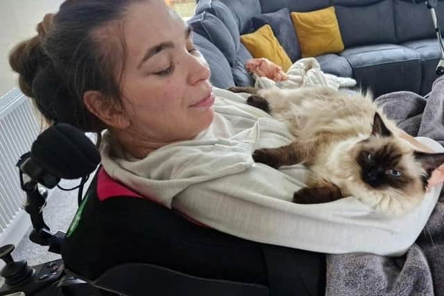 Christine Gill previously pictured with her beloved cat, Misty.