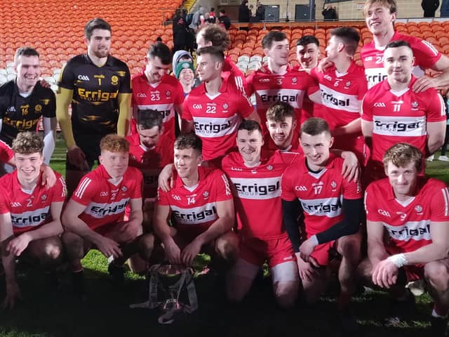 Derry celebrate their McKenna Cup victory in the Armagh Athletic Grounds.