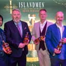The new IslandMen Irish Whiskey created by Wild Atlantic Distillery founders, Jim Nash, and Brian Ash, who have officially launched their new single malt Irish whiskey and new blended whiskey in The Guildhall, pictured with Nicola Kelly and Mike Crone, who designed the bottle. Picture Martin McKeown. 28.03.25