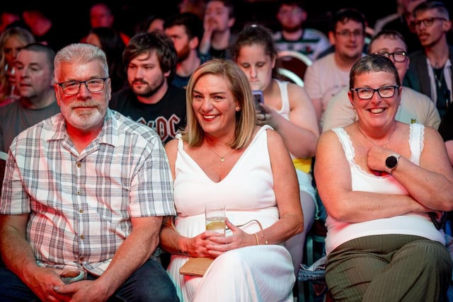 These audience members have front row seats to take in the action from Saturday's Foyle Rumble at the City Hotel. Photographs by Stephen Latimer.