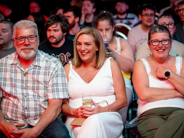 These audience members have front row seats to take in the action from Saturday's Foyle Rumble at the City Hotel. Photographs by Stephen Latimer.