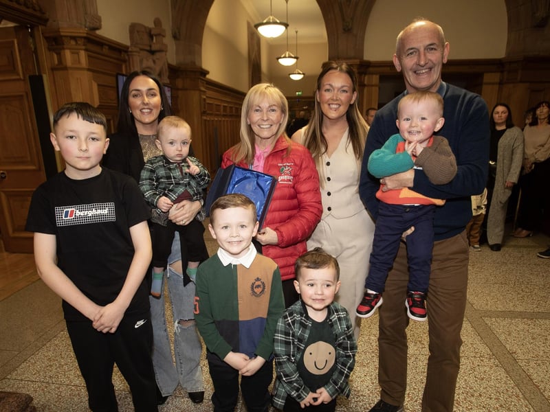 Paula McGilloway pictured with her husband Paul and family at Friday night's reception.