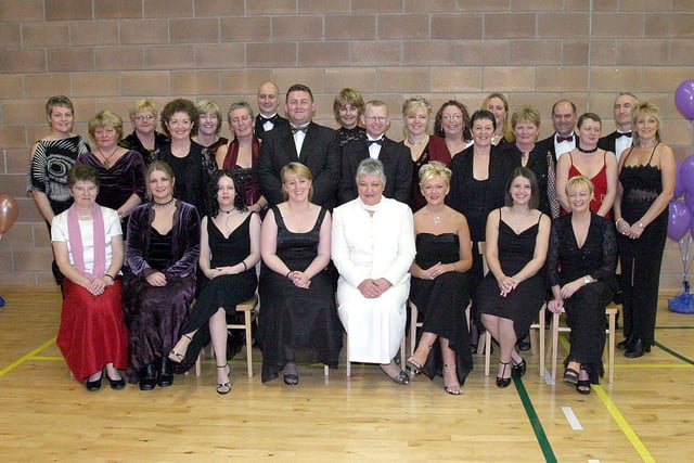 Michael Dobbins (standing, centre, left), principal of Foyle View Special school with teaching staff who attended the school's inagural dinner held in Pitchers. (0112T04).:.