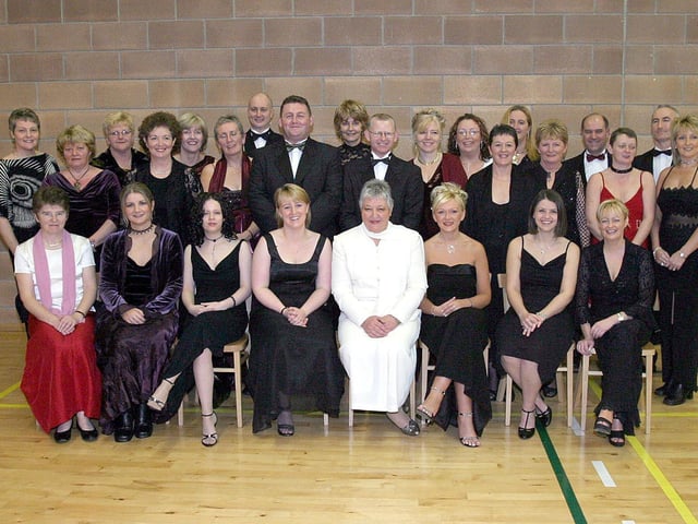 Michael Dobbins (standing, centre, left), principal of Foyle View Special school with teaching staff who attended the school's inagural dinner held in Pitchers. (0112T04).:.