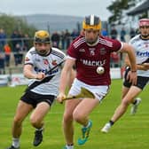 Kevin Lynch’s Eoghan Cassidy chases Slaughtneil’s Shéa Cassidy during last season's Derry senior Final. Photo: George Sweeney.  DER2239GS – 020