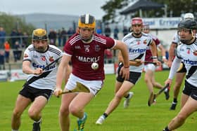 Kevin Lynch’s Eoghan Cassidy chases Slaughtneil’s Shéa Cassidy during last season's Derry senior Final. Photo: George Sweeney.  DER2239GS – 020