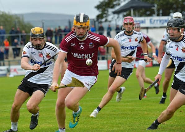Kevin Lynch’s Eoghan Cassidy chases Slaughtneil’s Shéa Cassidy during last season's Derry senior Final. Photo: George Sweeney. DER2239GS – 020