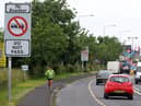 Cars cross the controless border between Northern Ireland and Ireland at the Muff border between Derry and Donegal. (PAUL FAITH/AFP via Getty Images)