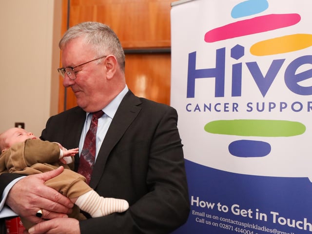 Minister of Health Mike Nesbitt pictured with baby Daithi Duddy.