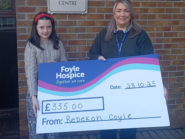 Rebekah Coyle, presenting a cheque for £335 to Ailbhe McDaid, Community Fundraiser, Foyle Hospice, proceeds from a Halloween Hamper Raffle.