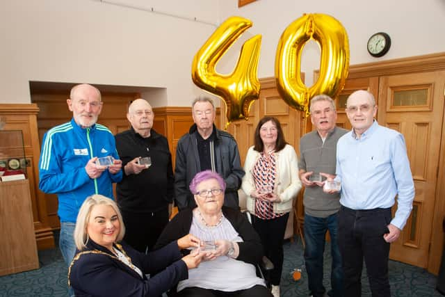 Mayor of Derry City and Strabane District Council, Councillor Sandra Duffy, with founding committee members of the Waterside Half Marathon.