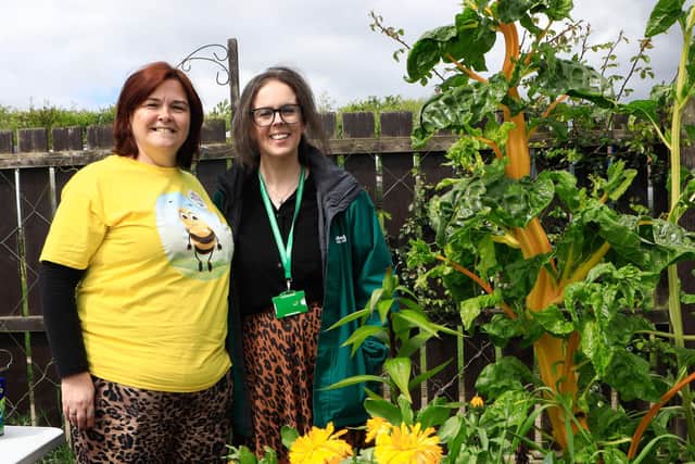 Maureen Collins (Hive), with Sarah Christy, Policy and Public Affairs Manager for Northern Ireland of Macmillan Cancer Support who recently gave Hive Cancer Support a grant of £150,000 at the Hive Cancer Support event celebrating 21st birthday on World Bee Day at Ballymagowan Allotments. (Photo - Tom Heaney, nwpresspics)