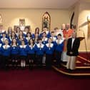 ST. PAUL'S PS CONFIRMATION. . . .Children from St. Paul's Primary School, Slievemore who received the Sacrament of Confirmation from Fr. Noel McDermott at St. Joseph's Church, Galliagh on Wednesday last. Included are Fr Michael McGaughey, PP, Fr. Sean O'Donnell, CC, Fr. McDermott, Ms. McGinty, P7 teacher and Ms. Niamh Dunlop classroom assistant. (Photos: JIm McCafferty Photography)