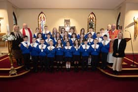 ST. PAUL'S PS CONFIRMATION. . . .Children from St. Paul's Primary School, Slievemore who received the Sacrament of Confirmation from Fr. Noel McDermott at St. Joseph's Church, Galliagh on Wednesday last. Included are Fr Michael McGaughey, PP, Fr. Sean O'Donnell, CC, Fr. McDermott, Ms. McGinty, P7 teacher and Ms. Niamh Dunlop classroom assistant. (Photos: JIm McCafferty Photography)