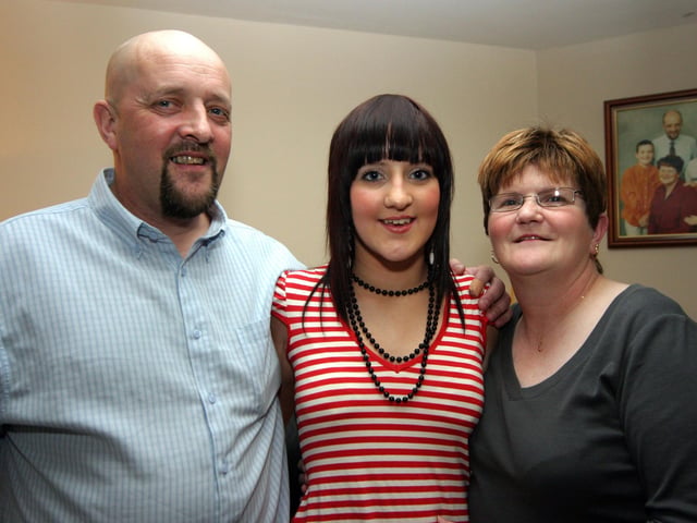 Bronagh pictured with her mum and dad on the occasion of her 18th birthday 0165JML : Parties and celebrations January 2006: Bronagh Halpenny.