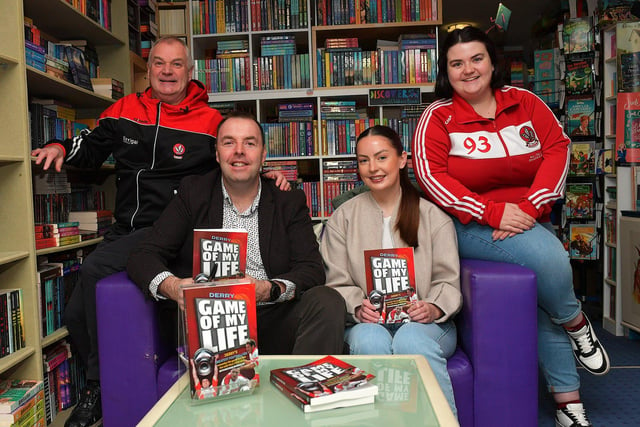 Journalist Michael McMullan pictured with Diarmuid McElholm, Bláthnaid McElholm, and Aine McElholm at the launch of his new Derry GAA Book ‘Game of my Life’, in the Little Acorns Book Store, on Saturday morning. Photo: George Sweeney