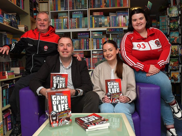 Journalist Michael McMullan pictured with Diarmuid McElholm, Bláthnaid McElholm, and Aine McElholm at the launch of his new Derry GAA Book ‘Game of my Life’, in the Little Acorns Book Store, on Saturday morning. Photo: George Sweeney