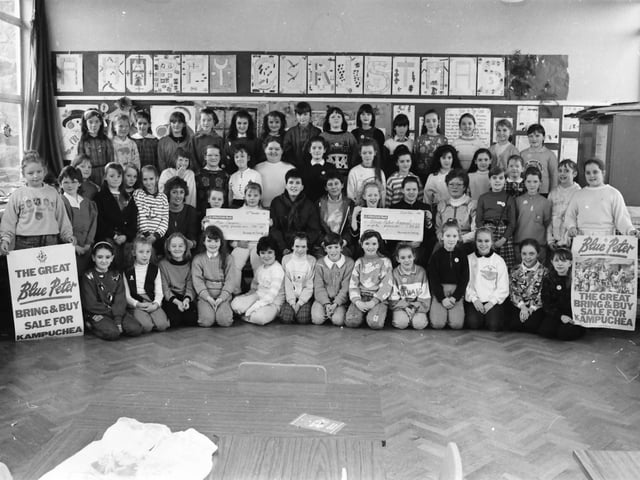 Pupils from St. Patrick's Primary Girls' School presenting a cheque for relief for 'Kampuchea' (Cambodia).