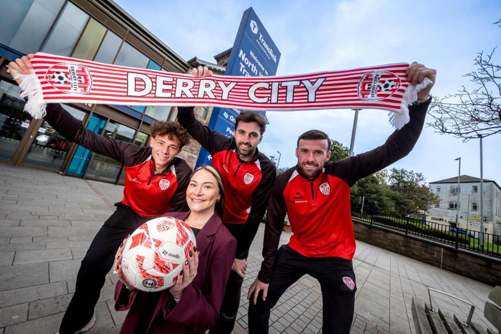 Hannah Rooney, Translink Assistant Route Manager for Northern Area Rail, pictured at the North West Transport Hub with Derry City FC players Nick Twisk, Ellis Chapman and Patrick McClean.