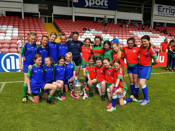 Tower Cup Girls' winners 2023, Sacred Heart Primary School pictured with the Anglo-Celt Cup. Photo: George Sweeney. DER2321GS – 138