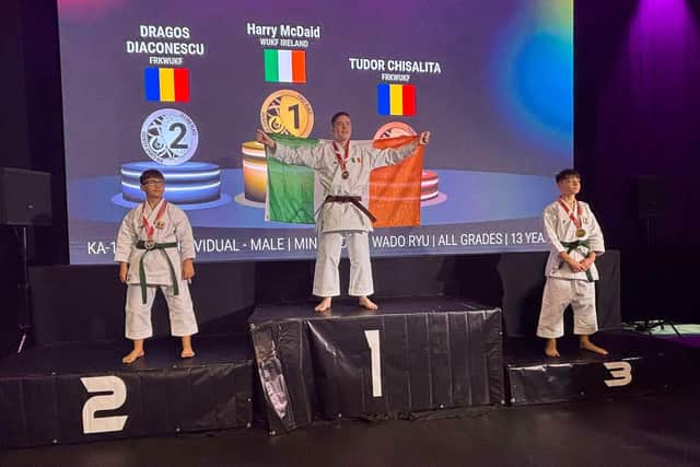 GOLDEN BOY . . . Harry McDaid wins gold in the 13 years and under kata section.