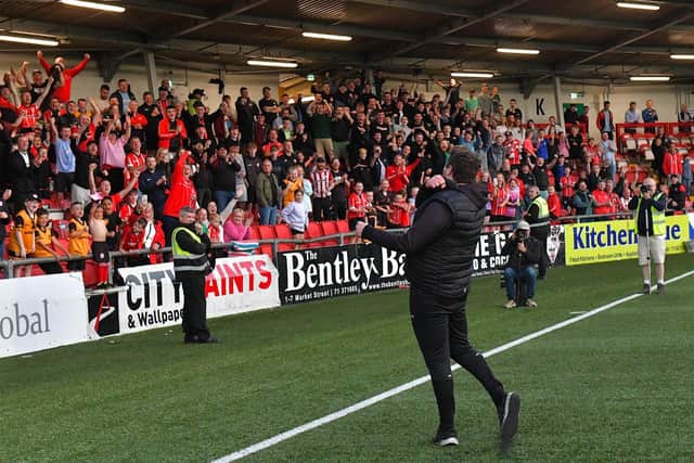 Derry City manager Ruaidhri Higgins salutes fans at Brandywell.