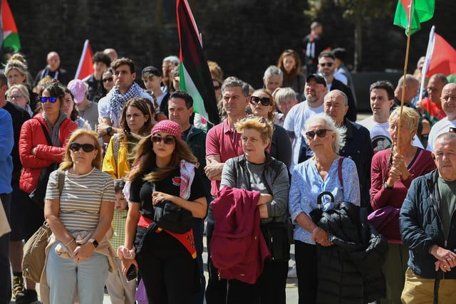 People gather at a rally in Guildhall Square, organised by the Derry Branch of Ireland Palestine Solidarity Campaign to mark 300 days of Genocide in Gaza. Photo: George Sweeney