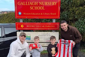 Conor Coyle and Michael Duffy with their children who attend Galliagh Nursery School