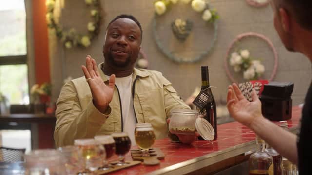 Comedian Babatunde Aléshé finds out more about the journey from grain to glass, during filming for a new Channel 4 mini-series called Where to Next?, at the Walled City Brewery. Picture: –Channel 4.