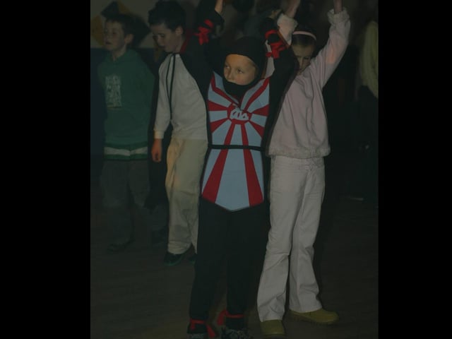 Young people boogying at a Halloween Disco in 2003